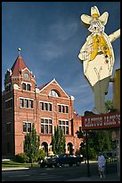 Giant Cactus Jack sign and brick building. Carson City, Nevada, USA ( color)