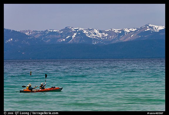 Kayak, turquoise waters and snowy mountains, East Shore, Lake Tahoe, Nevada. USA (color)