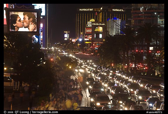 Congested foot and car traffic on Las Vegas Boulevard on Saturday night. Las Vegas, Nevada, USA (color)