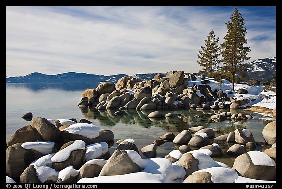 Snow and boulders on shore, Sand Harbor, Lake Tahoe-Nevada State Park, Nevada. USA