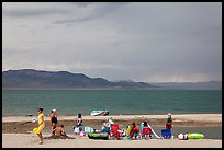 Lakeshore beach recreation, approaching storm. Pyramid Lake, Nevada, USA (color)