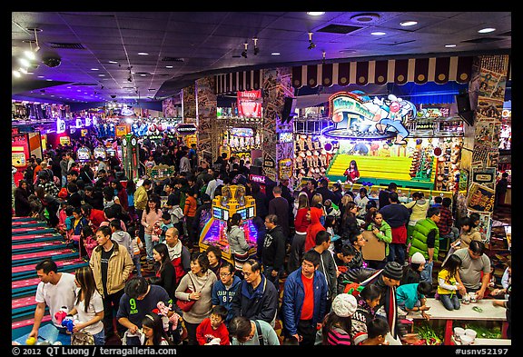 Crowded carnival game area. Reno, Nevada, USA (color)