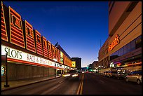 Casinos bordering street at dusk. Reno, Nevada, USA ( color)