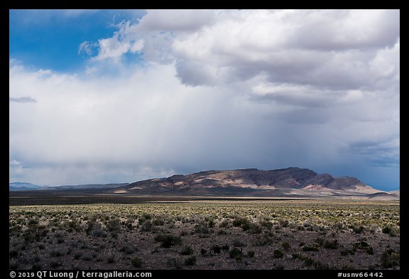 Wide valley, distant mountains, and clouds. Basin And Range National Monument, Nevada, USA (color)