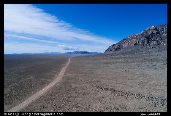 Aerial view of road through wide valley. Basin And Range National Monument, Nevada, USA (color)