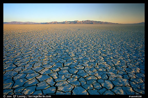 Ancient lakebed with cracked dried mud, sunrise, Black Rock Desert. Nevada, USA