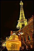 Fountain, opera house and Eiffel tower, Paris Las Vegas by night. Las Vegas, Nevada, USA