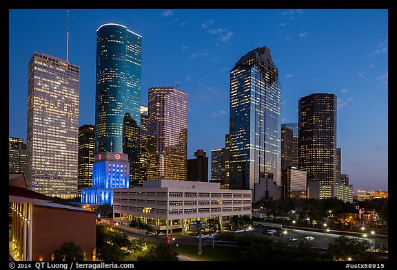 Skyline with lights at dusk. Houston, Texas, USA (color)