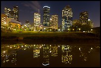 Dowtown skyline and reflection at night. Houston, Texas, USA ( color)