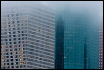 Top of high-rise buildings capped by fog. Houston, Texas, USA ( color)