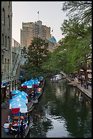 Riverwalk promenade, approaching barge. San Antonio, Texas, USA ( color)