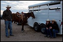 Group talking next to horse and trailer. Fort Worth, Texas, USA ( color)