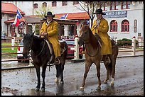 Cowboys in raincoats. Fort Worth, Texas, USA ( color)
