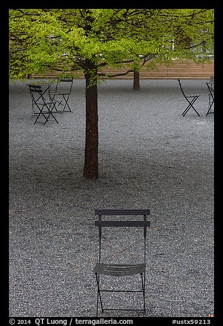 Chairs and trees in courtyard of Dallas Museum of Art. Dallas, Texas, USA (color)