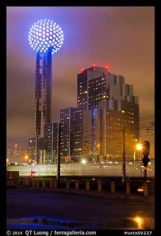 Reunion Tower and passing train at night. Dallas, Texas, USA