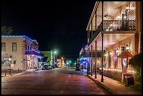 Street with historic buildings at night. Jefferson, Texas, USA ( color)