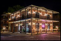 House with wrought iron balconies at night. Jefferson, Texas, USA ( color)