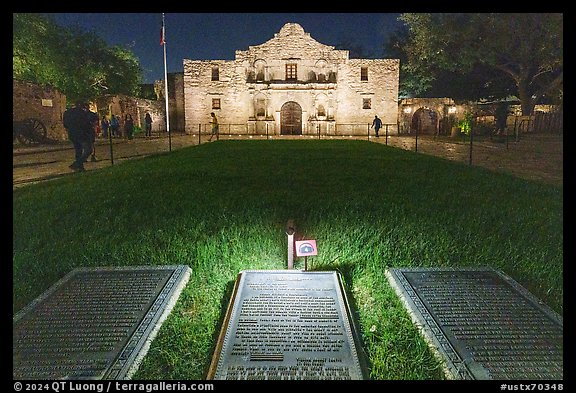 Commemorative signs and the Alamo at night. San Antonio, Texas, USA (color)