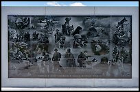 Mural with etched images of action during World War II, the Korean War, the Vietnam War, and Middle East wars, Military Working Dog Teams National Monument. San Antonio, Texas, USA ( color)