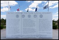 Granite wall with history incriptions, and the five US Armed Service flags, Military Working Dog Teams National Monument. San Antonio, Texas, USA ( color)