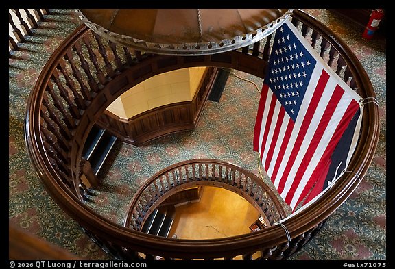 American flag inside historic Presidio County Courthouse stairwell, Marfa. Texas, USA (color)