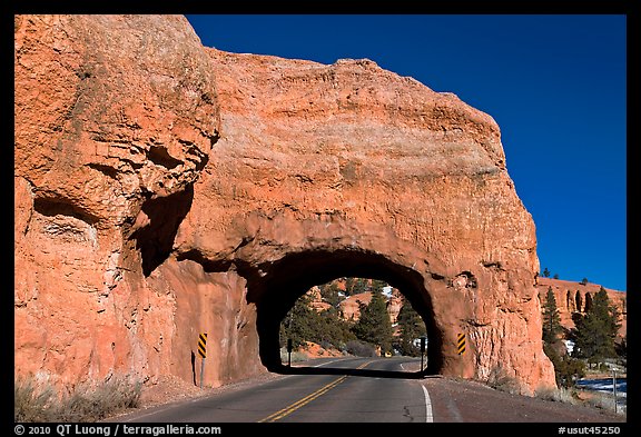 Road tunnel in pink limestone cliff. Utah, USA (color)