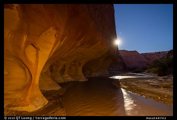 Windows of the Paria River and moon. Grand Staircase Escalante National Monument, Utah, USA