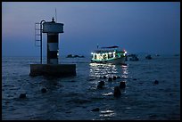 Lighted boat a dusk. Phu Quoc Island, Vietnam ( color)