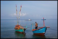 Fisherman on skiff. Phu Quoc Island, Vietnam (color)
