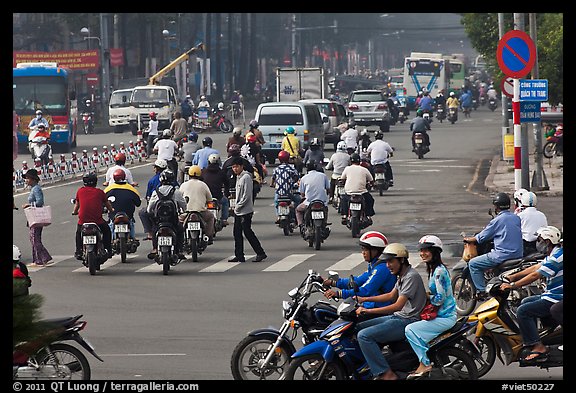 Motorcyle traffic on large avenue. Ho Chi Minh City, Vietnam (color)