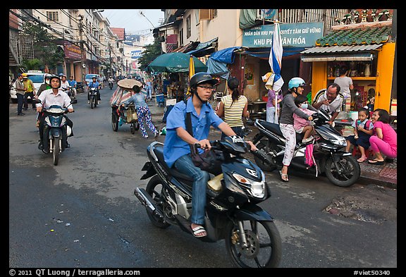 Early morning street scene. Ho Chi Minh City, Vietnam