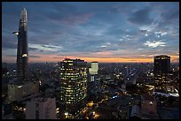 Bitexco Tower and city skyline at sunset. Ho Chi Minh City, Vietnam ( color)