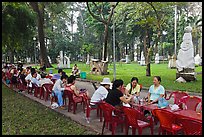 Outdoor refreshments served in front of sculpture garden, Cong Vien Van Hoa Park. Ho Chi Minh City, Vietnam (color)