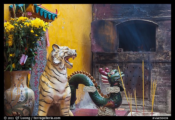 Ceramic tiger, dragon, and oven, Quan Am Pagoda. Cholon, District 5, Ho Chi Minh City, Vietnam (color)