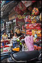 Store selling traditional dragon masks. Cholon, Ho Chi Minh City, Vietnam ( color)