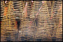Burning incense coils, Thien Hau Pagoda. Cholon, District 5, Ho Chi Minh City, Vietnam (color)