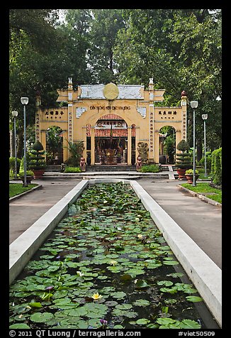 Lilly pond and temple gate, Van Hoa Park. Ho Chi Minh City, Vietnam