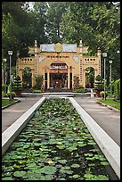 Lilly pond and temple gate, Cong Vien Van Hoa Park. Ho Chi Minh City, Vietnam (color)