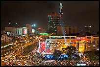 Cityscape with dense rush hour traffic at the intersection of two main boulevards. Ho Chi Minh City, Vietnam (color)