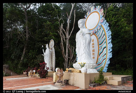 Two Buddhist statues. Ta Cu Mountain, Vietnam (color)