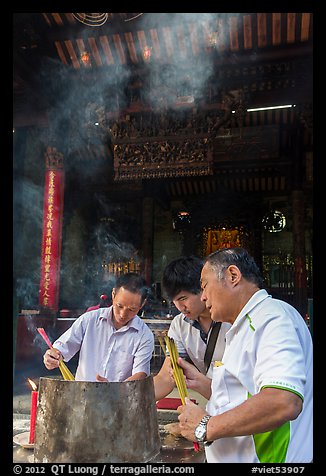 Worshippers burning incense, Thien Hau Pagoda. Cholon, District 5, Ho Chi Minh City, Vietnam