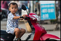 Boy on scooter. Can Tho, Vietnam (color)