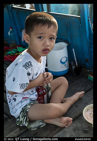 Boy on barge. Can Tho, Vietnam (color)