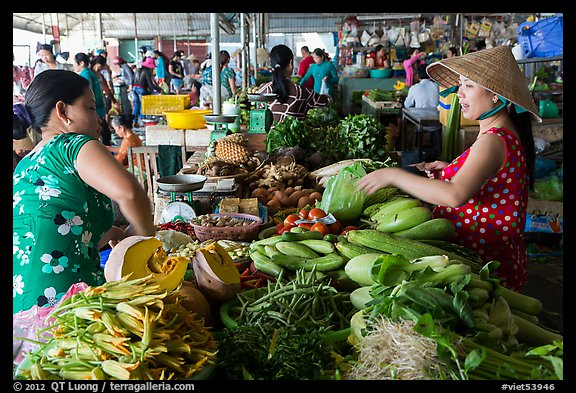Buying and selling vegetable inside covered market, Cai Rang. Can Tho, Vietnam