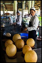 Crispy spherical shells beeing prepared. Mekong Delta, Vietnam ( color)