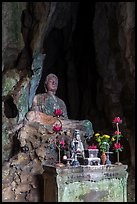 Altar and Buddha statue in grotto. Da Nang, Vietnam (color)