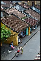 Old houses with tile rooftops and street from above. Hoi An, Vietnam (color)