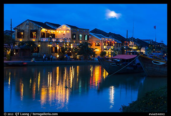 Moonrise over houses and river. Hoi An, Vietnam