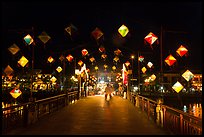 Cam Nam bridge with lighted lanterns at night. Hoi An, Vietnam ( color)