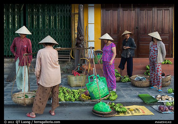 Curbside fruit vendors. Hoi An, Vietnam